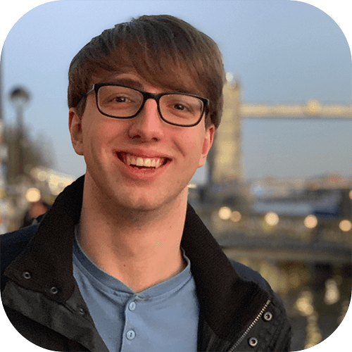 A picture of Aaron Carson with Tower Bridge in London behind.